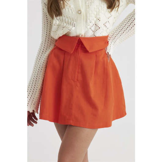 تنورة قصيرة نسائية جبردين مزينة بطية على الخصر لون برتقالي