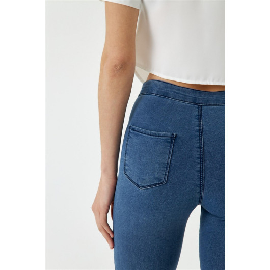 بنطال جينز نسائي بخصر عالي من الليكرا بلون أزرق