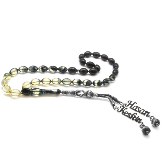 Amber Rosary With Black And White Gauze Tassels With A Name Written On It
