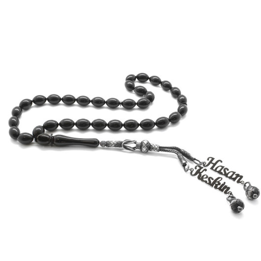 Pressed Amber Rosary With Black Kazaz Tassels With A Name Written On It