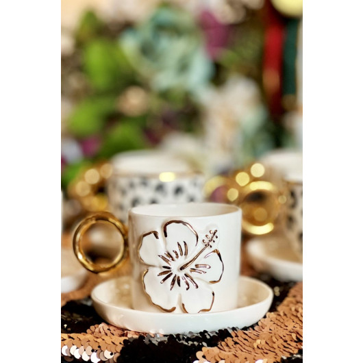 طقم فنجان قهوة مفرد مزين برسم زهرة الزنبق