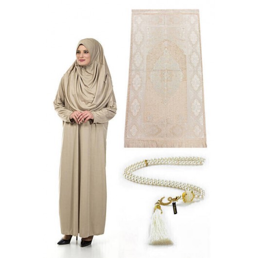 A Prayer Rug With A Women Prayer Garment And Prayer Beads