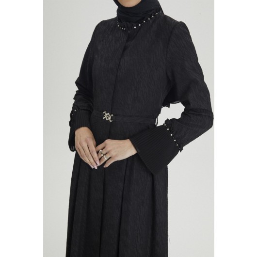 Black Topcoat With Belt Buckle And Accessory Detail