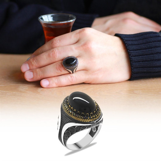 خاتم رجالي من الفضة عيار 925  مع حجر الأونيكس لون أسود تصميم بيضاوي