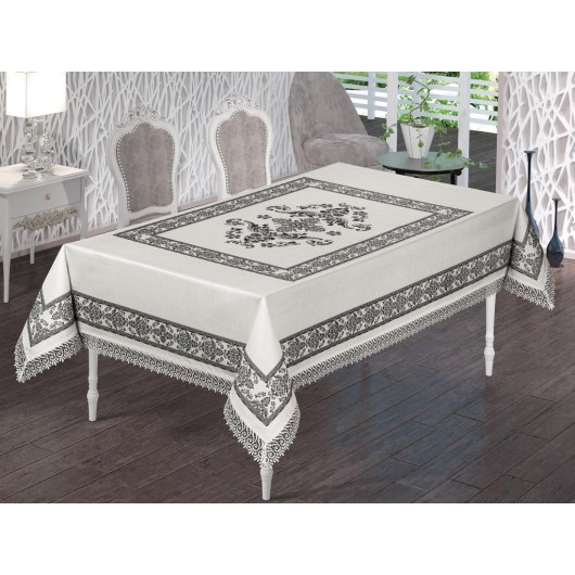 A Rectangular Tablecloth Printed In Different Colors Surrounded By Lace On 4 Sides