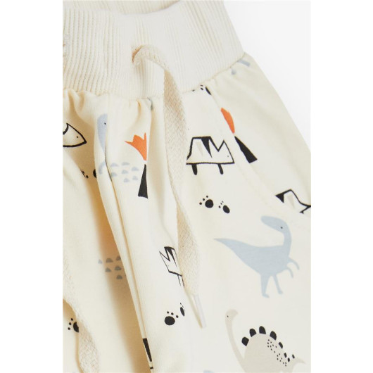 Boys Sweatpants With Dinosaur Printed Pocket Lace Accessory Cream (1-4 Ages)