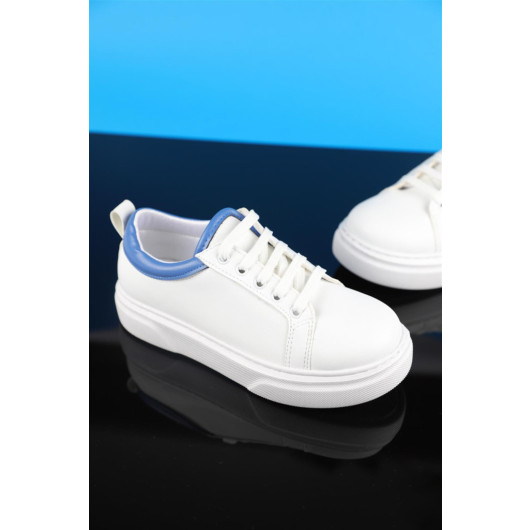 حذاء سنيكر لون أبيض وأزرق بمقاسات بين 31 - 35