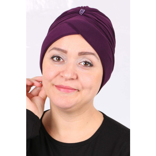 A Purple Womens Turban Hijab Adorned With Stones