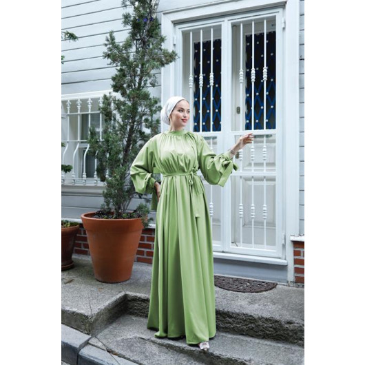 فستان حجاب فضفاض اخضر فستقي بياقة زم