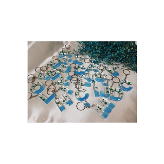 ميدالية مفاتيح بشكل حرف N ايبوكسي بزهور زرقاء