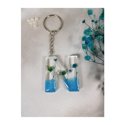 ميدالية مفاتيح بشكل حرف N ايبوكسي بزهور زرقاء