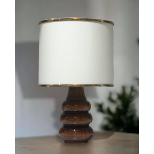 Small Cream And Gold Lamp With A Wood Base