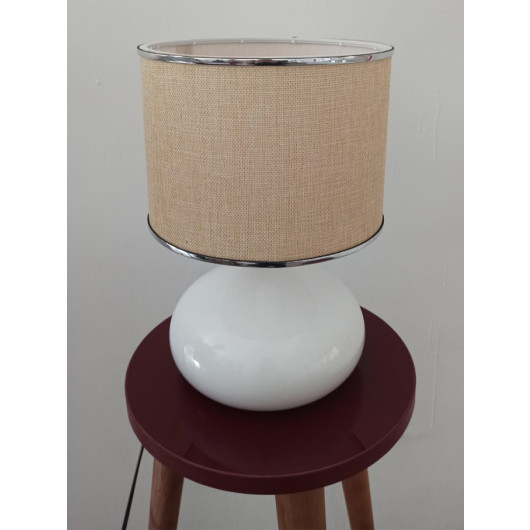 White Desk Lamp With A Light Pink Head And A Silver Ribbon