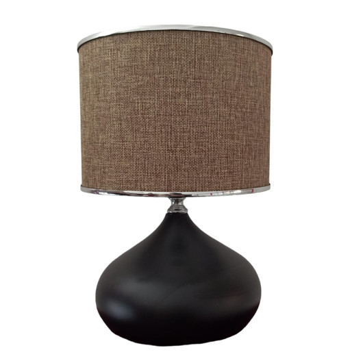 Black Desk Lamp With A Beige Head And A Silver Ribbon