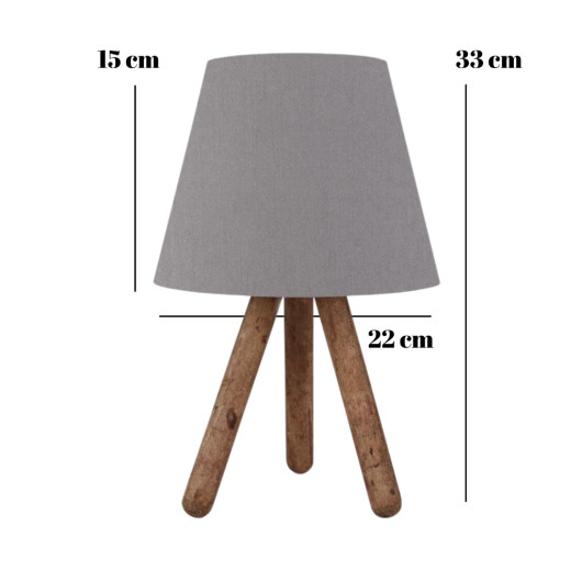 Wooden Lamp With Three Legs And A Gray Cloth Head