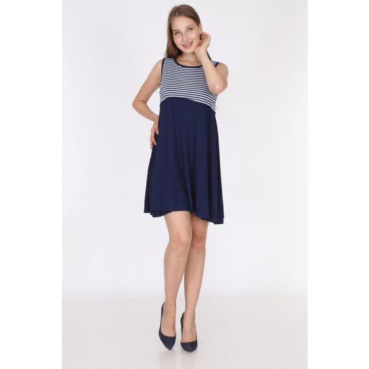 Sleeveless Nursing Dress With Navy Blue Stripes On The Top And Black Bottoms