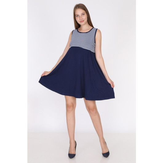 Sleeveless Nursing Dress With Navy Blue Stripes On The Top And Black Bottoms