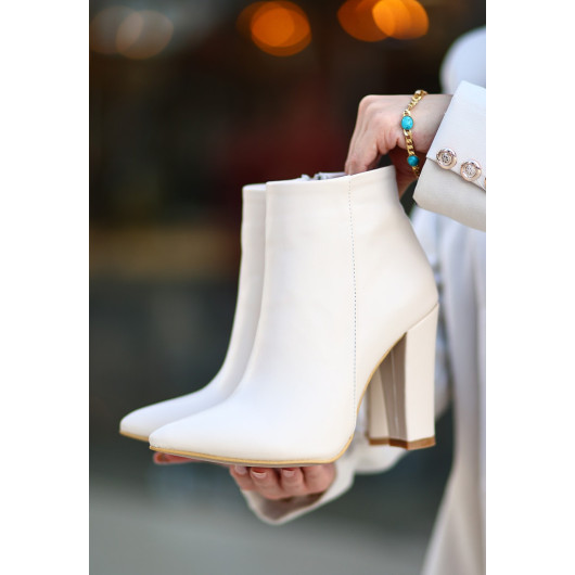 Skin Heeled Boots