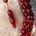 Master Work Barley Cut Red Squeezed Amber Rosary