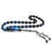 Pressed Amber Rosary With Blue Tassels With A Name Written On It
