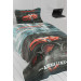 A Children Bedsheet With A Racing Car Illustration
