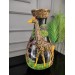 A Flower Vase Adorned With A Three Dimensional Giraffe Motif