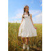 فستان بناتي بحمالات بلون أبيض مزين بزهور لعمر بين 08 - 14 سنة