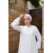 A White Women's Ramadan Silk Jalabiya Adorned With Decorations