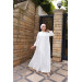 A White Women's Ramadan Silk Jalabiya Adorned With Decorations