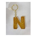 ميدالية مفاتيح ايبوكسي برسم حرف N ذهبية لامعة