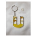 ميدالية مفاتيح شفافة من الايبوكسي برسمة حرف U