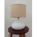 White Desk Lamp With A Light Pink Head And A Silver Ribbon